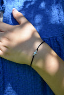 Pulsera Hilo con Cruz de Plata .925