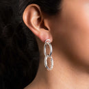 Aretes Aro Entrelazados en Movimiento