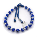 Pulsera Hilo Azul Ojitos con Dije San Benito y Bolitas de Plata .925